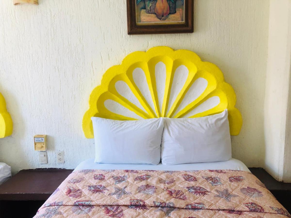 Hotel Playa Santa Cruz By Rotamundos Huatulco Buitenkant foto