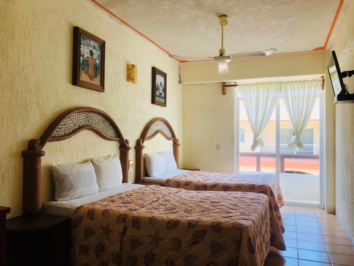 Hotel Playa Santa Cruz By Rotamundos Huatulco Buitenkant foto