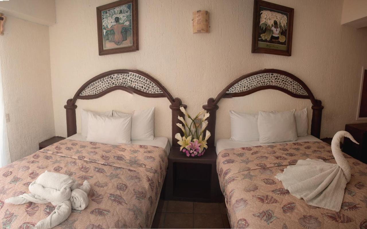 Hotel Playa Santa Cruz By Rotamundos Huatulco Buitenkant foto